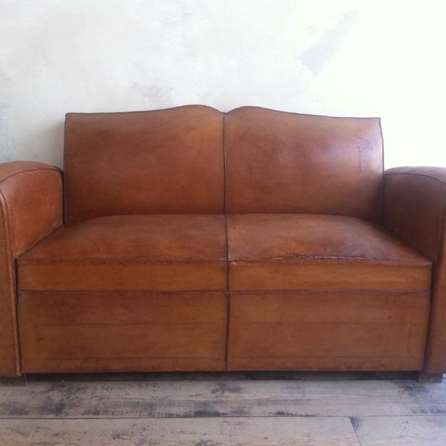French leather Moustache back sofa