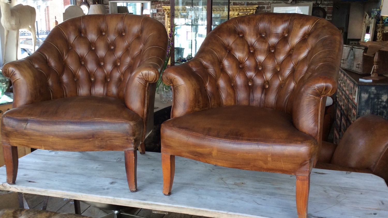 Pair of chesterfield leather chairs