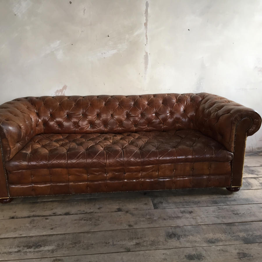 Tan leather chesterfield sofa