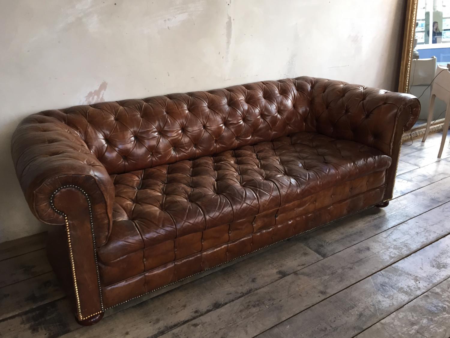 Tan leather chesterfield sofa