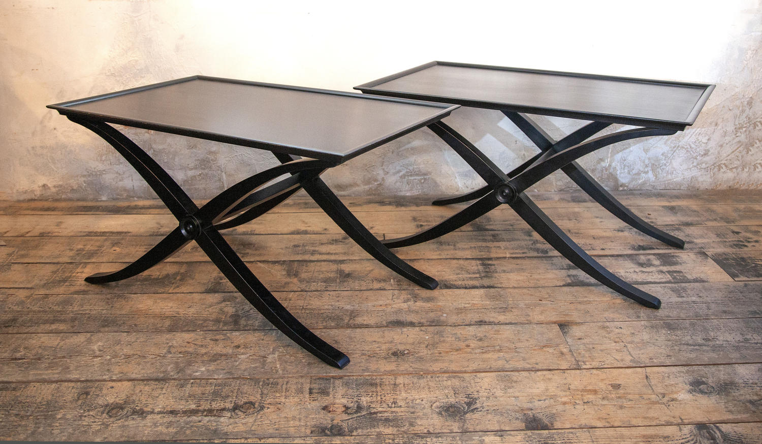 A pair of Ebonised Regency style X frame Side tables