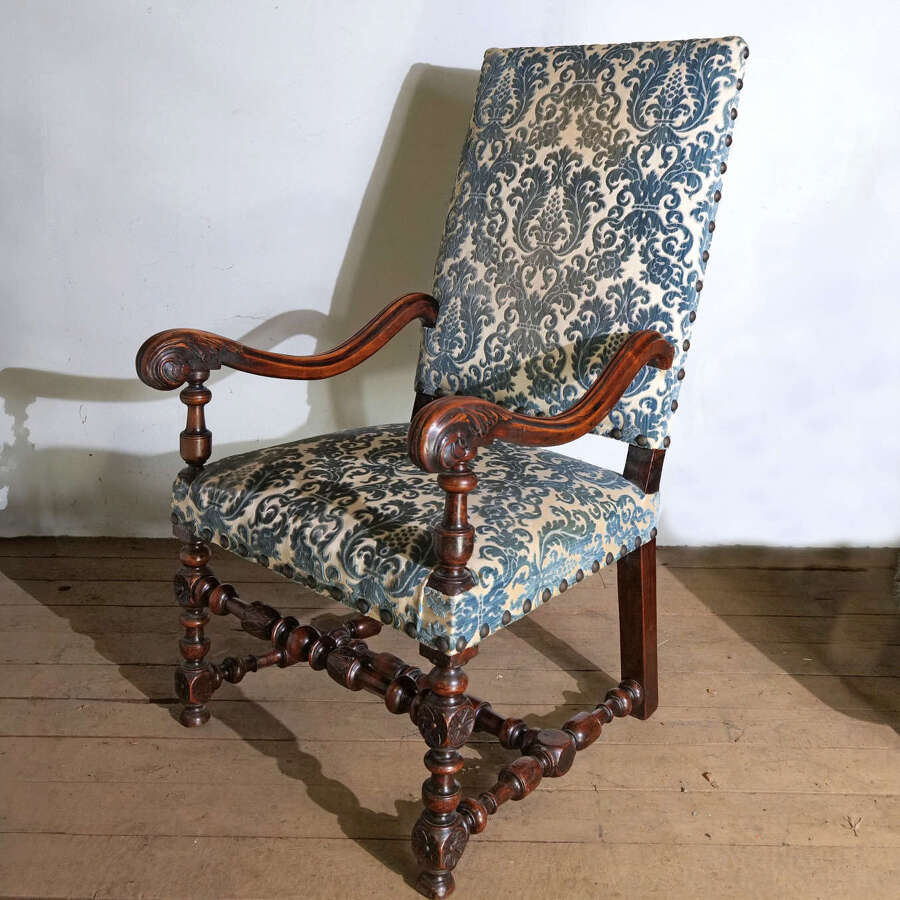 Early 18th c  French carved Walnut open arm chair