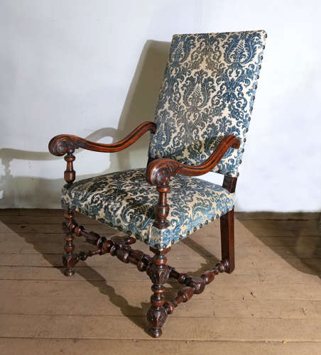 Early 18th c  French carved Walnut open arm chair